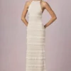 Rochie maxi Tove cu volane, fără spate și cu gât halter, în culoarea Ivory Rochie maxi Tove cu volane, fără spate și cu gât halter, în culoarea Ivory