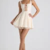Rochie micro mini A-line cu detaliu de cravată Nanisca, culoare ivoriu Rochie micro mini A-line cu detaliu de cravată Nanisca, culoare ivoriu