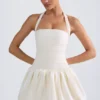 Rochie micro mini cu corset, cu decolteu în V și șnururi, cu tiv bufant, Ludmila, în culoarea Ivory Rochie micro mini cu corset, cu decolteu în V și șnururi, cu tiv bufant, Ludmila, în culoarea Ivory