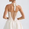 Rochie micro mini cu corset, cu decolteu în V și șnururi, cu tiv bufant, Ludmila, în culoarea Ivory Rochie micro mini cu corset, cu decolteu în V și șnururi, cu tiv bufant, Ludmila, în culoarea Ivory