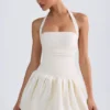 Rochie micro mini cu corset, cu decolteu în V și șnururi, cu tiv bufant, Ludmila, în culoarea Ivory Rochie micro mini cu corset, cu decolteu în V și șnururi, cu tiv bufant, Ludmila, în culoarea Ivory
