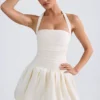Rochie micro mini cu corset, cu decolteu în V și șnururi, cu tiv bufant, Ludmila, în culoarea Ivory Rochie micro mini cu corset, cu decolteu în V și șnururi, cu tiv bufant, Ludmila, în culoarea Ivory