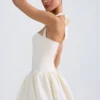 Rochie micro mini cu corset, cu decolteu în V și șnururi, cu tiv bufant, Ludmila, în culoarea Ivory Rochie micro mini cu corset, cu decolteu în V și șnururi, cu tiv bufant, Ludmila, în culoarea Ivory