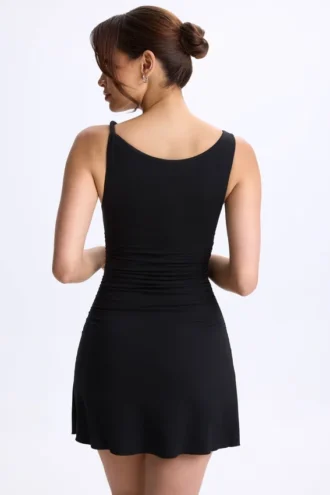 Rochie micro mini Ione din modal, cu volane și croi în A, de culoare neagră Rochie micro mini Ione din modal, cu volane și croi în A, de culoare neagră
