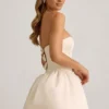 Rochie midi-ax Gloriana convertibilă, cu detaliu fundă și tiv bufant, în culoarea ivoriu
