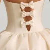 Rochie midi-ax Gloriana convertibilă, cu detaliu fundă și tiv bufant, în culoarea ivoriu