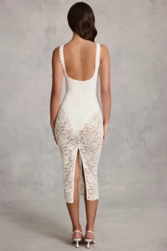 Rochie midi-axială Caia din dantelă transparentă cu decolteu adânc și margini festonate, de culoare albă Rochie midi-axială Caia din dantelă transparentă cu decolteu adânc și margini festonate, de culoare albă