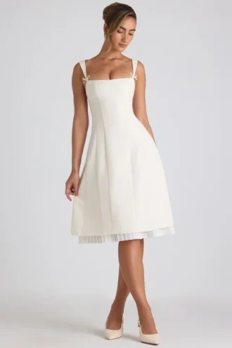 Rochie midi plisată în A cu detaliu fundă Isadora, culoare ivoriu Rochie midi plisată în A cu detaliu fundă Isadora, culoare ivoriu