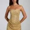 Rochie mini A-line cu bandă și ornamente Amalina, în culoarea auriu