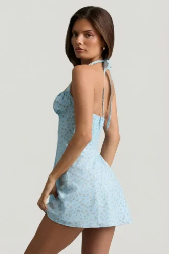 Rochie mini A-line cu gât halter Nerine, cu imprimeu floral albastru Rochie mini A-line cu gât halter Nerine, cu imprimeu floral albastru