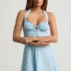 Rochie mini A-line cu gât halter Nerine, cu imprimeu floral albastru Rochie mini A-line cu gât halter Nerine, cu imprimeu floral albastru