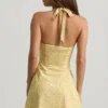 Rochie mini A-line cu gât halter Nerine cu imprimeu floral galben Rochie mini A-line cu gât halter Nerine cu imprimeu floral galben
