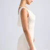 Rochie mini A-line cu umeri decupați și spate în formă de cap de balenă Tigen, culoare ivoriu