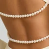 Rochie mini Akari cu decupaje și detalii cu perle, în culoarea ivoriu