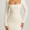 Rochie mini Akari cu decupaje și detalii cu perle, în culoarea ivoriu
