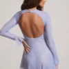 Rochie mini albastră cu mâneci lungi și spate decupat, cu ornamente Dixie Rochie mini albastră cu mâneci lungi și spate decupat, cu ornamente Dixie