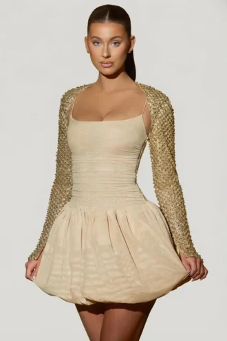 Rochie mini Aletta cu tiv bufant și ornamente, în culoarea auriu Rochie mini Aletta cu tiv bufant și ornamente, în culoarea auriu