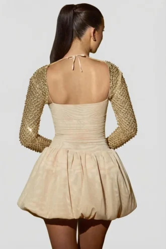 Rochie mini Aletta cu tiv bufant și ornamente, în culoarea auriu Rochie mini Aletta cu tiv bufant și ornamente, în culoarea auriu