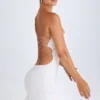 Rochie mini bandeau cu decupaje și volane Misa, albă Rochie mini bandeau cu decupaje și volane Misa, albă