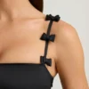 Rochie mini Cirilla cu detalii cu fundițe și tiv bufant, în negru