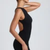 Rochie mini Coa din modal, cu guler înalt și spate decupat, în negru