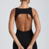 Rochie mini Coa din modal, cu guler înalt și spate decupat, în negru