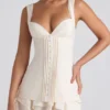 Rochie mini corset Cassandra cu volane și detalii cu nasturi, culoare ivoriu