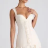 Rochie mini corset Cassandra cu volane și detalii cu nasturi, culoare ivoriu