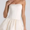 Rochie mini corset cu șireturi și tiv bufant Fabiola, culoare ivoriu