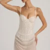Rochie mini corset drapată, semi-transparentă, cu ornamente, model Connie, în culoarea alb Rochie mini corset drapată, semi-transparentă, cu ornamente, model Connie, în culoarea alb