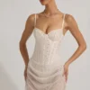 Rochie mini corset drapată, semi-transparentă, cu ornamente, model Connie, în culoarea alb Rochie mini corset drapată, semi-transparentă, cu ornamente, model Connie, în culoarea alb