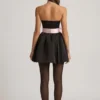 Rochie mini corset Norina cu detaliu fundă, în negru Rochie mini corset Norina cu detaliu fundă, în negru