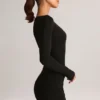 Rochie mini cu mâneci lungi și decolteu în V, drapată, din modal Eska, în culoarea negru Rochie mini cu mâneci lungi și decolteu în V, drapată, din modal Eska, în culoarea negru