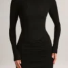 Rochie mini cu mâneci lungi și decolteu în V, drapată, din modal Eska, în culoarea negru Rochie mini cu mâneci lungi și decolteu în V, drapată, din modal Eska, în culoarea negru