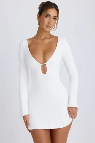 Rochie mini cu mâneci lungi și decupaje Mavisa, albă Rochie mini cu mâneci lungi și decupaje Mavisa, albă