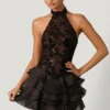 Rochie mini cu volane și gât halter Petalia, în negru Rochie mini cu volane și gât halter Petalia, în negru