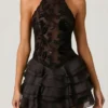 Rochie mini cu volane și gât halter Petalia, în negru Rochie mini cu volane și gât halter Petalia, în negru