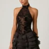Rochie mini cu volane și gât halter Petalia, în negru Rochie mini cu volane și gât halter Petalia, în negru