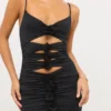 Rochie mini decupată Aniela din jersey elastic cu detalii de trandafiri, în negru Rochie mini decupată Aniela din jersey elastic cu detalii de trandafiri, în negru