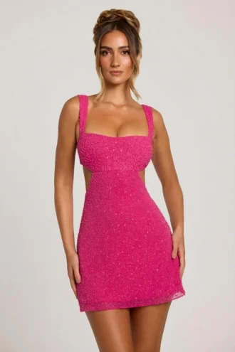 Rochie mini decupată Emilion cu ornamente, în culoarea fucsia