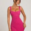 Rochie mini decupată Emilion cu ornamente, în culoarea fucsia Rochie mini decupată Emilion cu ornamente, în culoarea fucsia