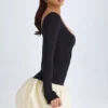 Rochie mini Delphi din modal, cu decolteu rotund, talie coborâtă și tiv bufant, în culoarea vanilie