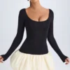 Rochie mini Delphi din modal, cu decolteu rotund, talie coborâtă și tiv bufant, în culoarea vanilie