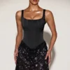 Rochie mini Eira din satin cu corset și fustă decorată, în negru și violet Rochie mini Eira din satin cu corset și fustă decorată, în negru și violet