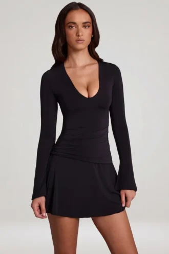 Rochie mini evazată din jersey moale Carielle, cu decolteu rotund, în negru Rochie mini evazată din jersey moale Carielle, cu decolteu rotund, în negru