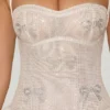 Rochie mini Felicity cu decolteu halter și tiv bufant, decorată, în culoarea ivoriu Rochie mini Felicity cu decolteu halter și tiv bufant, decorată, în culoarea ivoriu