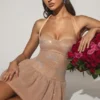 Rochie mini Felicity cu decolteu halter și tiv bufant, în culoarea Almond Rochie mini Felicity cu decolteu halter și tiv bufant, în culoarea Almond