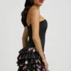 Rochie mini fără bretele Juliet cu volane și corset, cu imprimeu floral negru Rochie mini fără bretele Juliet cu volane și corset, cu imprimeu floral negru