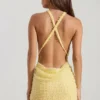 Rochie mini galbenă cu guler înalt și spate decupat, cu ornamente, de la Sylune