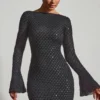 Rochie mini Grazina cu spate decupat și croi în A, cu ornamente, în negru Rochie mini Grazina cu spate decupat și croi în A, cu ornamente, în negru